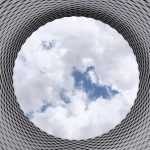Future Cities - Low-angle Photography of Grey and Black Tunnel Overlooking White Cloudy and Blue Sky