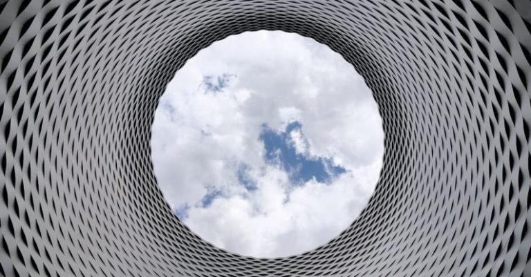 Future Cities - Low-angle Photography of Grey and Black Tunnel Overlooking White Cloudy and Blue Sky