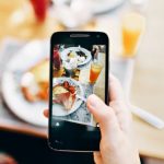 Food Technology - Person Holding Phone Taking Picture of Served Food