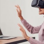 Entertainment Future - Woman Using Virtual Reality Goggles