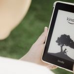 Electronics Biodegradable - Boy holding a kindle