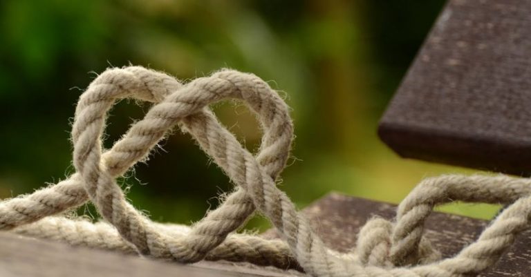 IoT Security - Brown Rope Tangled and Formed Into Heart Shape on Brown Wooden Rail
