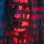 Human Cybersecurity - Woman With Red Light On Face
