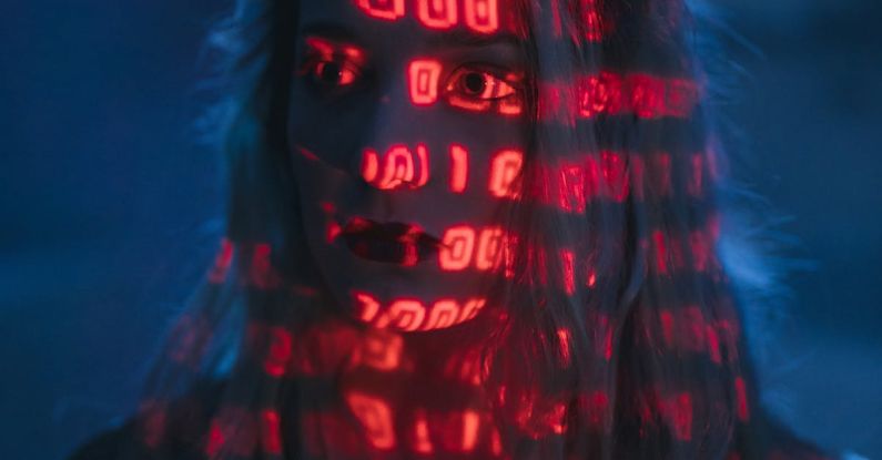 Human Cybersecurity - Woman With Red Light On Face