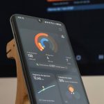 Language App - A wooden phone stand with a smartphone on it